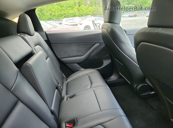 7SAYGDEF7RF043335 2024 TESLA MODEL Gray Սալոնի հետևի տեսք