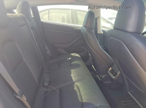 7SAYGDEF8NF348417 2022 TESLA MODEL Blue Widok wnętrza z tyłu
