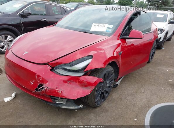 7SAYGDEF8PF848127 2023 TESLA MODEL Y Red წინა მარცხენა ხედი სამი მეოთხედიდან