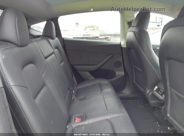 7SAYGDEF8PF848127 2023 TESLA MODEL Y Red VIN კოდის სტიკერის ხედი