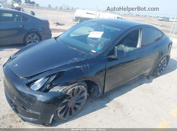 7SAYGDEF8PF875814 2023 TESLA MODEL Y Black წინა მარცხენა ხედი სამი მეოთხედიდან