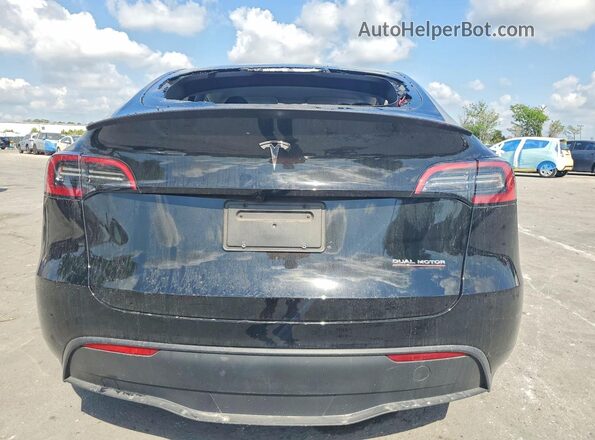 7SAYGDEF8SA348250 2025 TESLA MODEL Black Вид ззаду