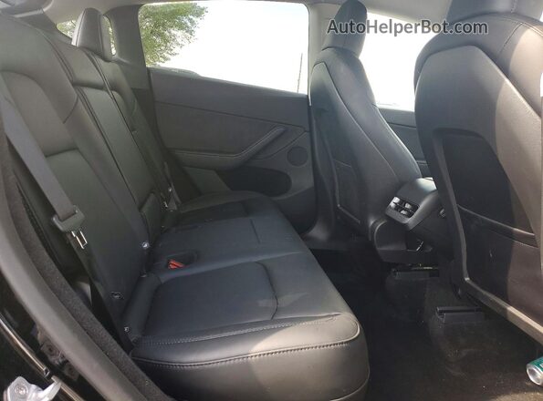 7SAYGDEF8SA348250 2025 TESLA MODEL Black Вид задніх сидінь