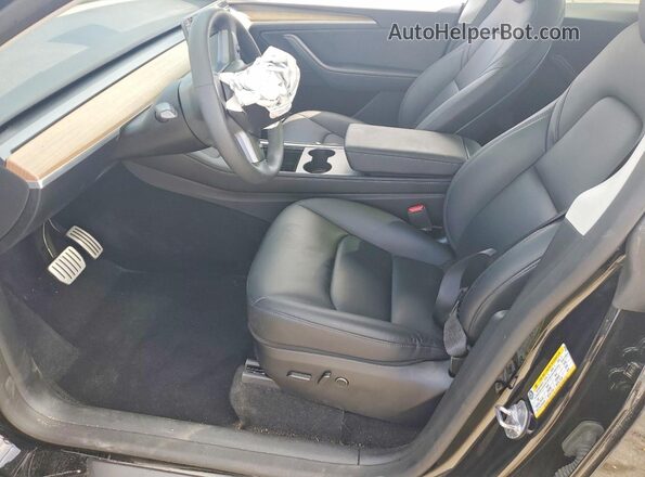 7SAYGDEF8SA348250 2025 TESLA MODEL Black Вид салону спереду