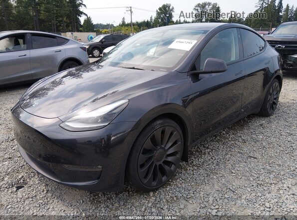 7SAYGDEF8SF265212 2025 TESLA MODEL Y Gray წინა მარცხენა ხედი სამი მეოთხედიდან
