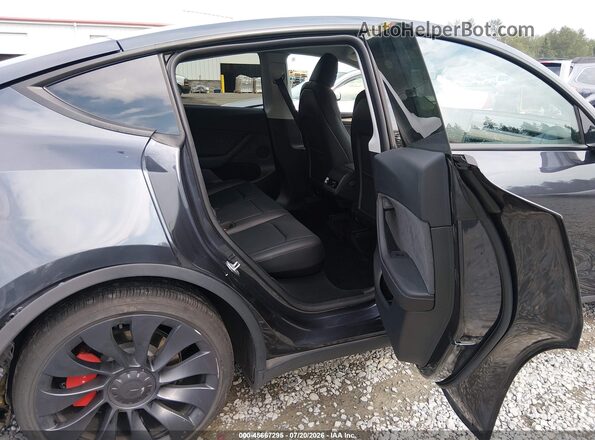 7SAYGDEF8SF265212 2025 TESLA MODEL Y Gray VIN კოდის სტიკერის ხედი