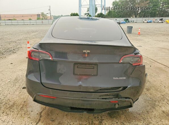 7SAYGDEF8SF310827 2025 TESLA MODEL Угольный Вид сзади