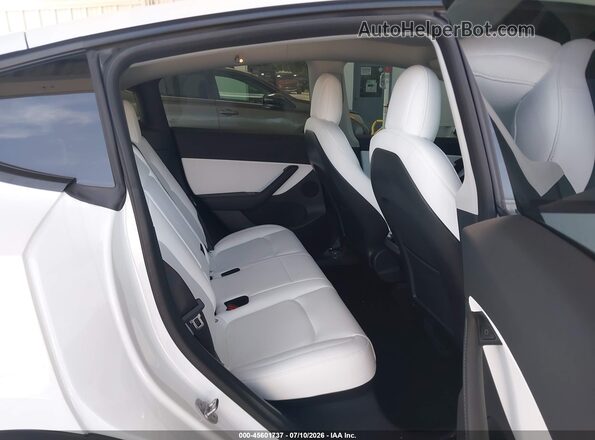 7SAYGDEF9NF380762 2022 TESLA MODEL Y White VIN კოდის სტიკერის ხედი