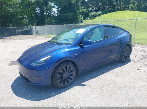 7SAYGDEF9PF645733 2023 TESLA MODEL Y Blue Przód lewy