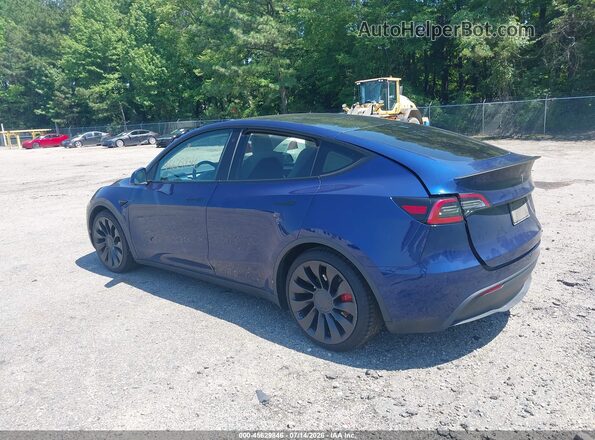 7SAYGDEF9PF645733 2023 TESLA MODEL Y Blue Tył lewy