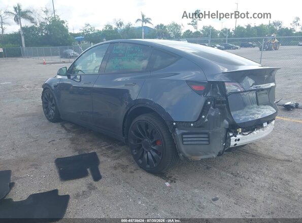 7SAYGDEF9PF840523 2023 TESLA MODEL Y Gray Trasero izquierdo