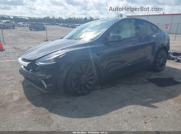 7SAYGDEF9PF840523 2023 TESLA MODEL Y Gray Vista tres cuartos delantera izquierda