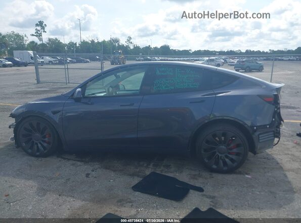 7SAYGDEF9PF840523 2023 TESLA MODEL Y Gray Vista interior trasera