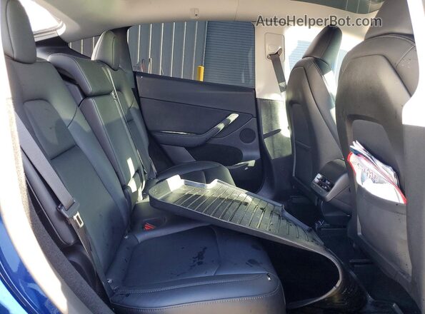 7SAYGDEF9RF154551 2024 TESLA MODEL Blue უკანა სავარძლების ხედი