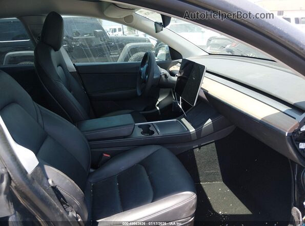 7SAYGDEFXNF405460 2022 TESLA MODEL Y Gray Front interior view