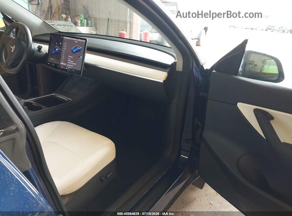 7SAYGDEFXNF414949 2022 TESLA MODEL Y Blue Vista interior delantera