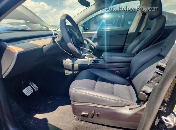 7SAYGDEFXNF460068 2022 TESLA MODEL Черный Вид салона спереди