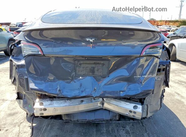 7SAYGDEFXPF798797 2023 TESLA MODEL Gray უკანა ხედი