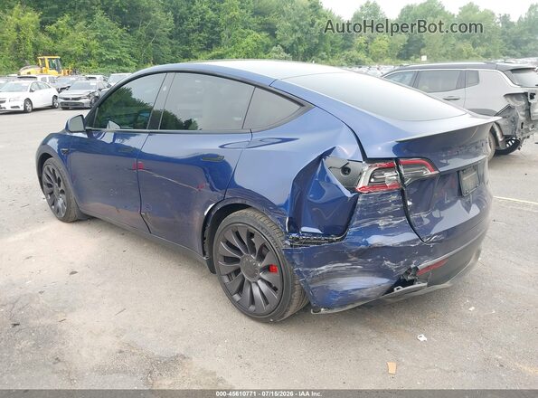 7SAYGDEFXRF026156 2024 TESLA MODEL Y Blue Trasero izquierdo