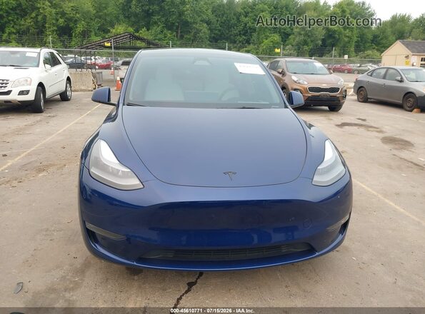 7SAYGDEFXRF026156 2024 TESLA MODEL Y Blue Vista del salpicadero