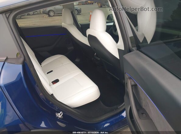 7SAYGDEFXRF026156 2024 TESLA MODEL Y Blue Vista de la etiqueta del VIN
