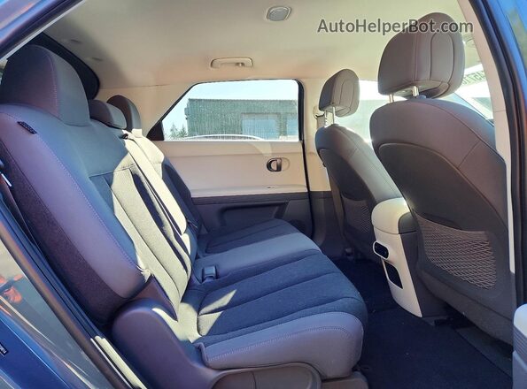7YAKMDDCXSY019614 2025 HYUNDAI IONIQ Двухцветный Вид задней части салона