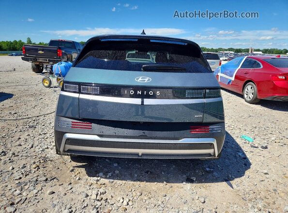 7YAKNDDC1TY045856 2026 HYUNDAI IONIQ Green Rear view
