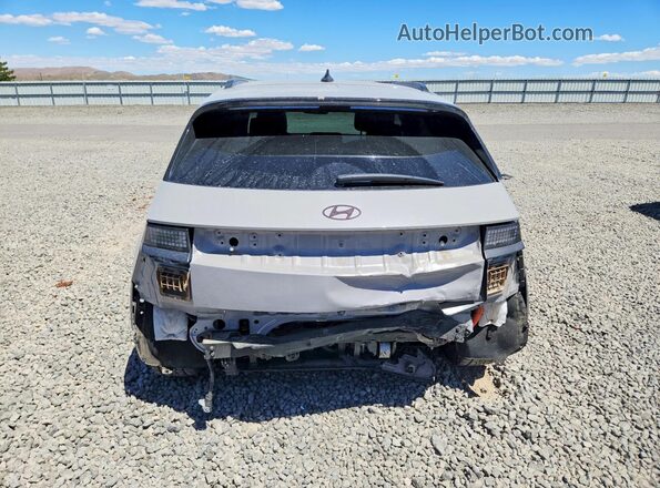 7YAKPDDCXSY033875 2025 HYUNDAI IONIQ Gray Հետևի տեսք