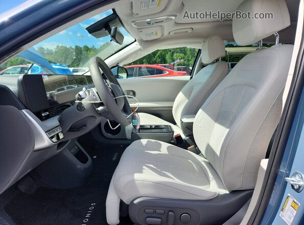 7YAKR4DA4SY035663 2025 HYUNDAI IONIQ Turquoise წინა სალონის ხედი