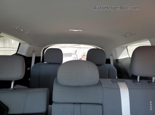 7YAMTFS3XTY003005 2026 HYUNDAI IONIQ White Vista de los asientos traseros