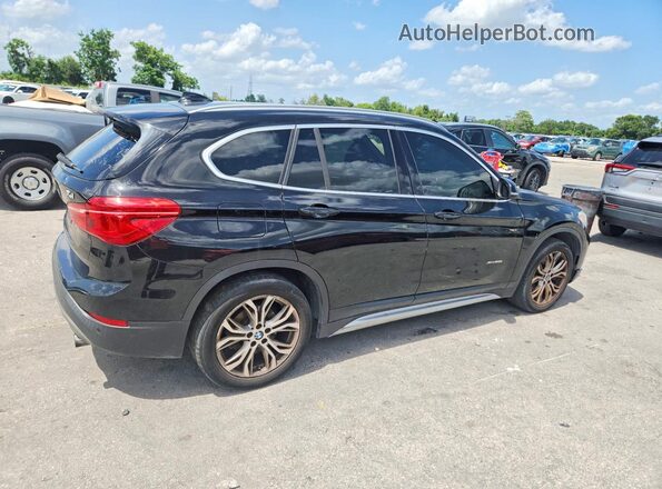 WBXHT3Z37H4A53653 2017 BMW X1 Black Передня права чверть