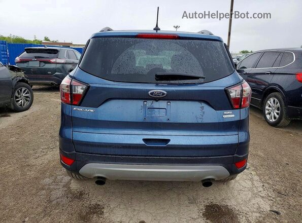 1FMCU0HD5JUA08609 2018 FORD ESCAPE Синий Вид салона спереди