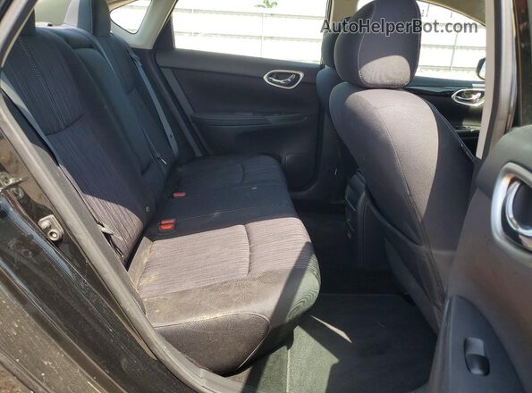 3N1AB7AP1JY289564 2018 NISSAN SENTRA Black Widok wnętrza z tyłu