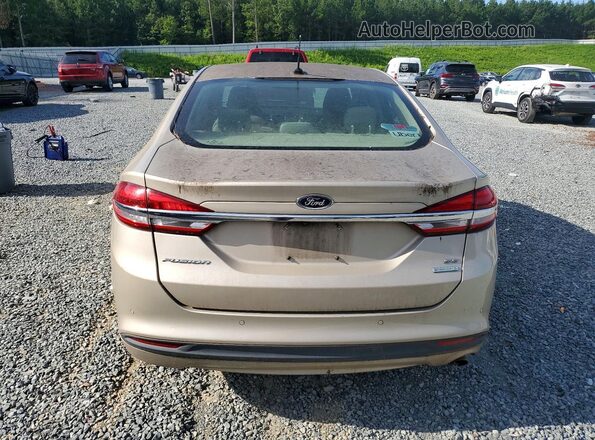 3FA6P0HD6JR185806 2018 FORD FUSION Gold Widok wnętrza z przodu