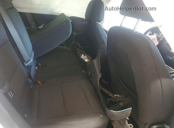 3GNAXHEG5SL265482 2025 CHEVROLET EQUINOX White Rear interior view
