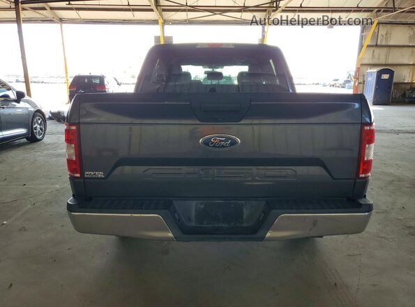 1FTEW1C51KKC90001 2019 FORD F150 Серый Вид салона спереди