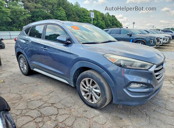KM8J33A46JU663500 2018 HYUNDAI TUCSON Gray Widok z przodu