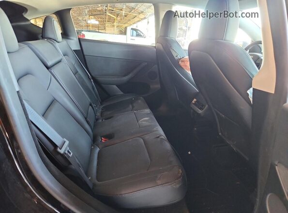 7SAYGDEE0PF920459 2023 TESLA MODEL Black Vista interior trasera