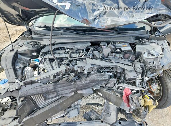 3KPFT4DEXSE102396 2025 KIA K4 Black Vista del compartimento del motor