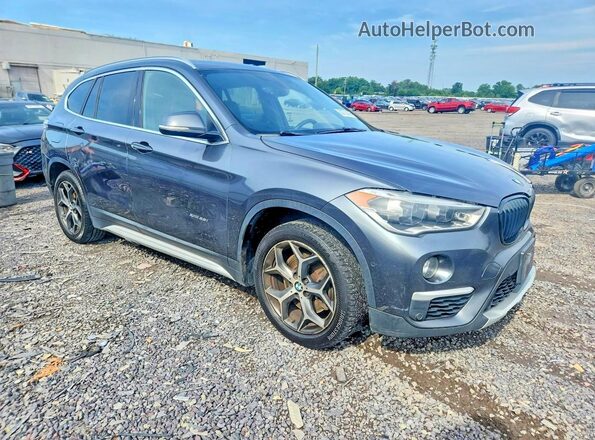 WBXHT3C33H5F72590 2017 BMW X1 Серый Вид спереди