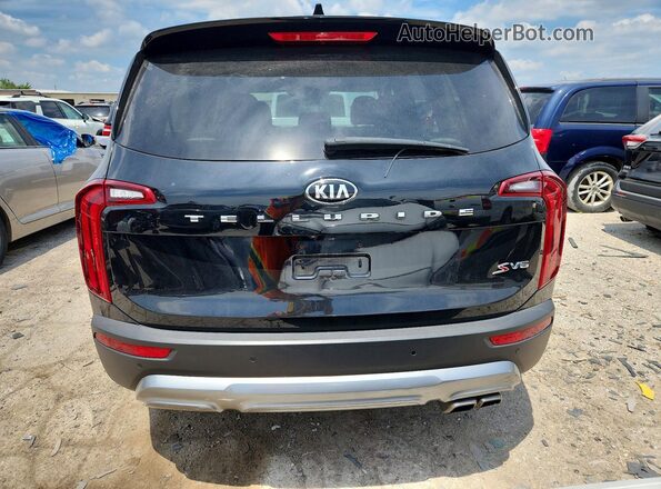 5XYP64HC8LG010471 2020 KIA TELLURIDE Black Front interior view
