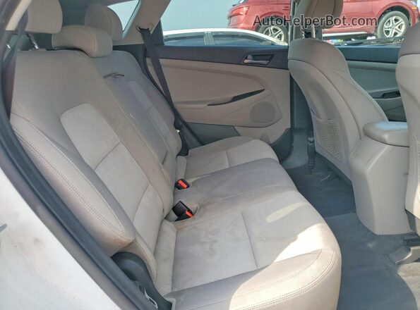 KM8J3CA20GU055382 2016 HYUNDAI TUCSON White Engine compartment view