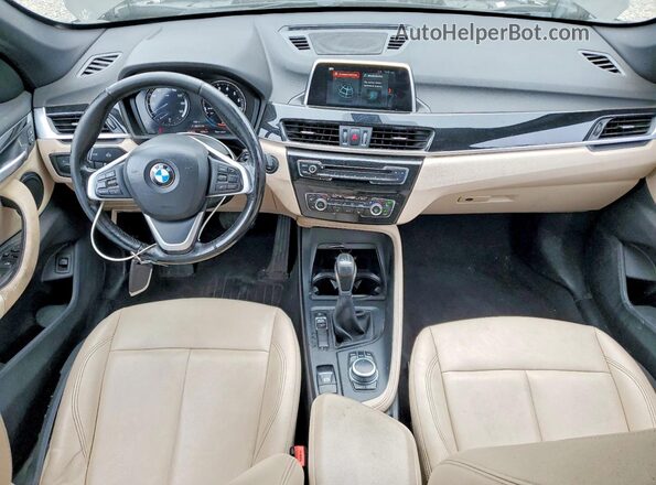 WBXHU7C33J3H43750 2018 BMW X1 Brown ხელსაწყოთა პანელის ხედი