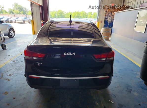 3KPA24AD4PE616535 2023 KIA RIO Black წინა სალონის ხედი