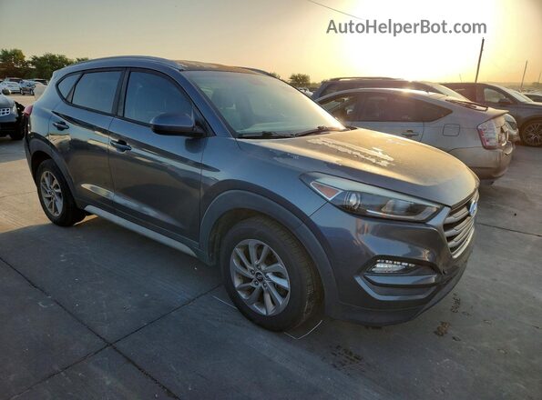 KM8J33A45JU663617 2018 HYUNDAI TUCSON Gray Front view