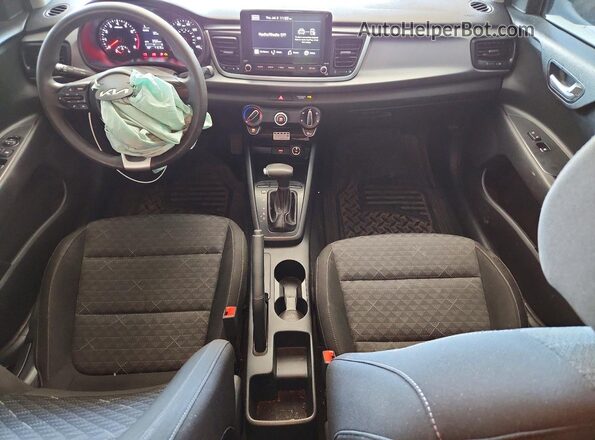 3KPA24AD4PE616535 2023 KIA RIO Black ხელსაწყოთა პანელის ხედი