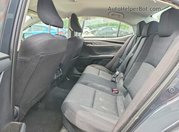 4T1DAACK2SU513808 2025 TOYOTA CAMRY Серый Вид задней части салона