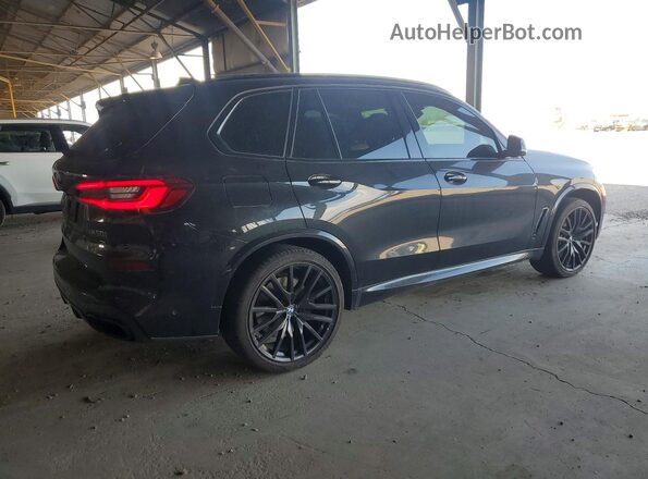 5UXJU4C05L9B94196 2020 BMW X5 Black Front right