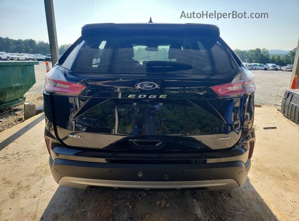 2FMPK4J97PBA47656 2023 FORD EDGE Black Front interior view