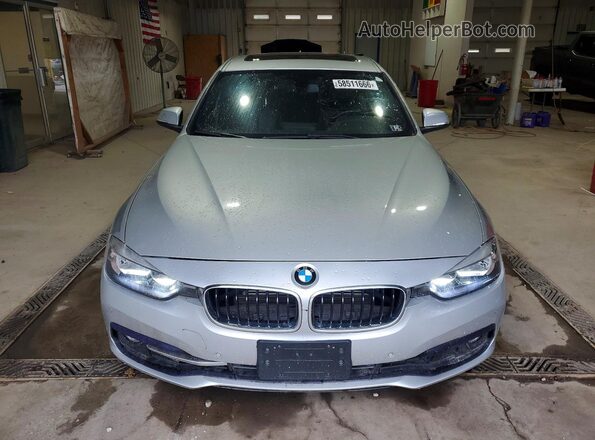 WBA8E1C50HK480443 2017 BMW 3 SERIES Silver Vista trasera